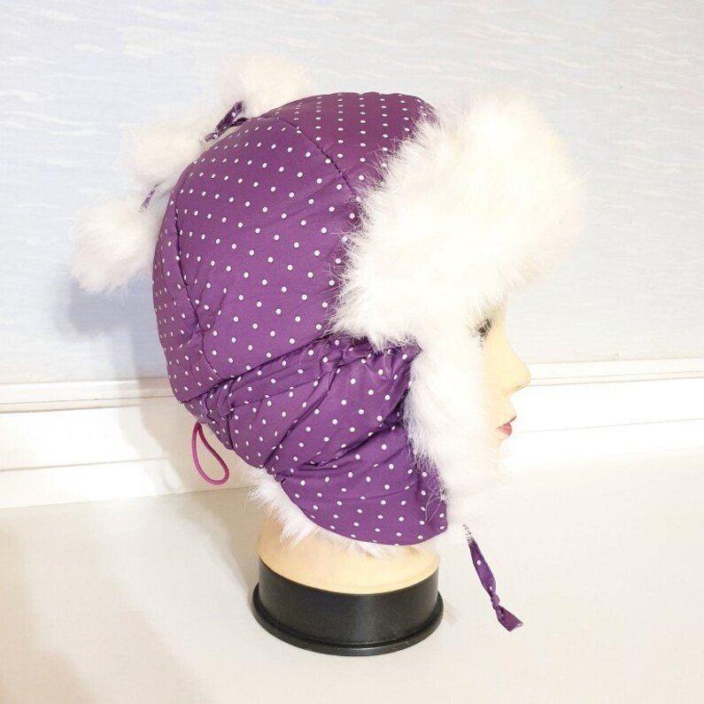 Violetinė vaikiška kepurė su kailiu